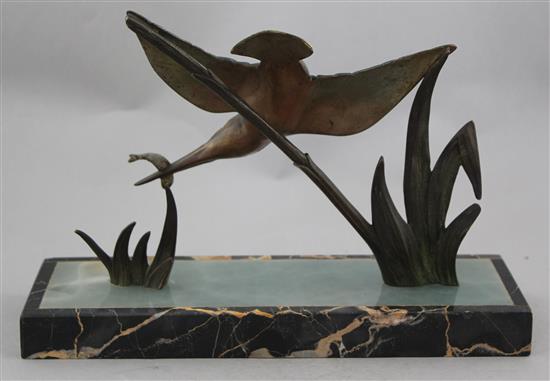 A French Art Deco patinated bronze model of a kingfisher, 11.75in.